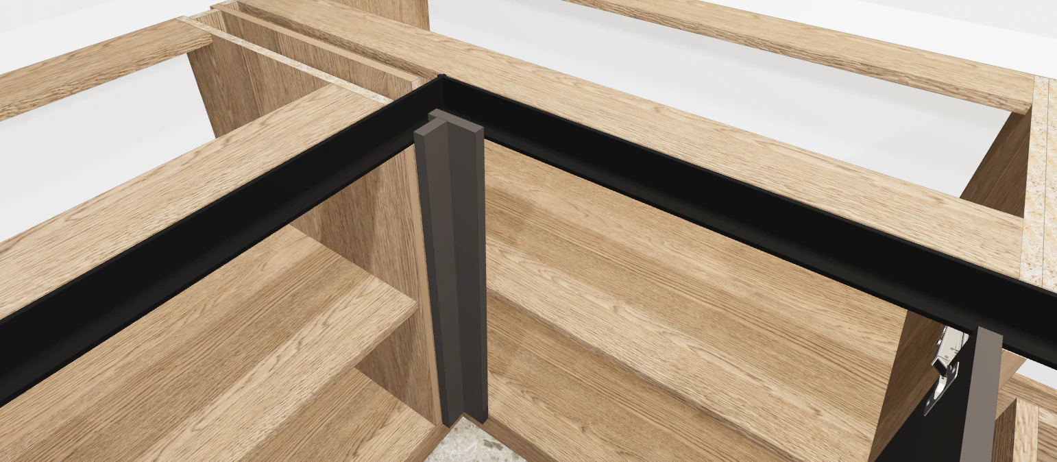 A handleless facade with a gola profile at a cabinet corner joint